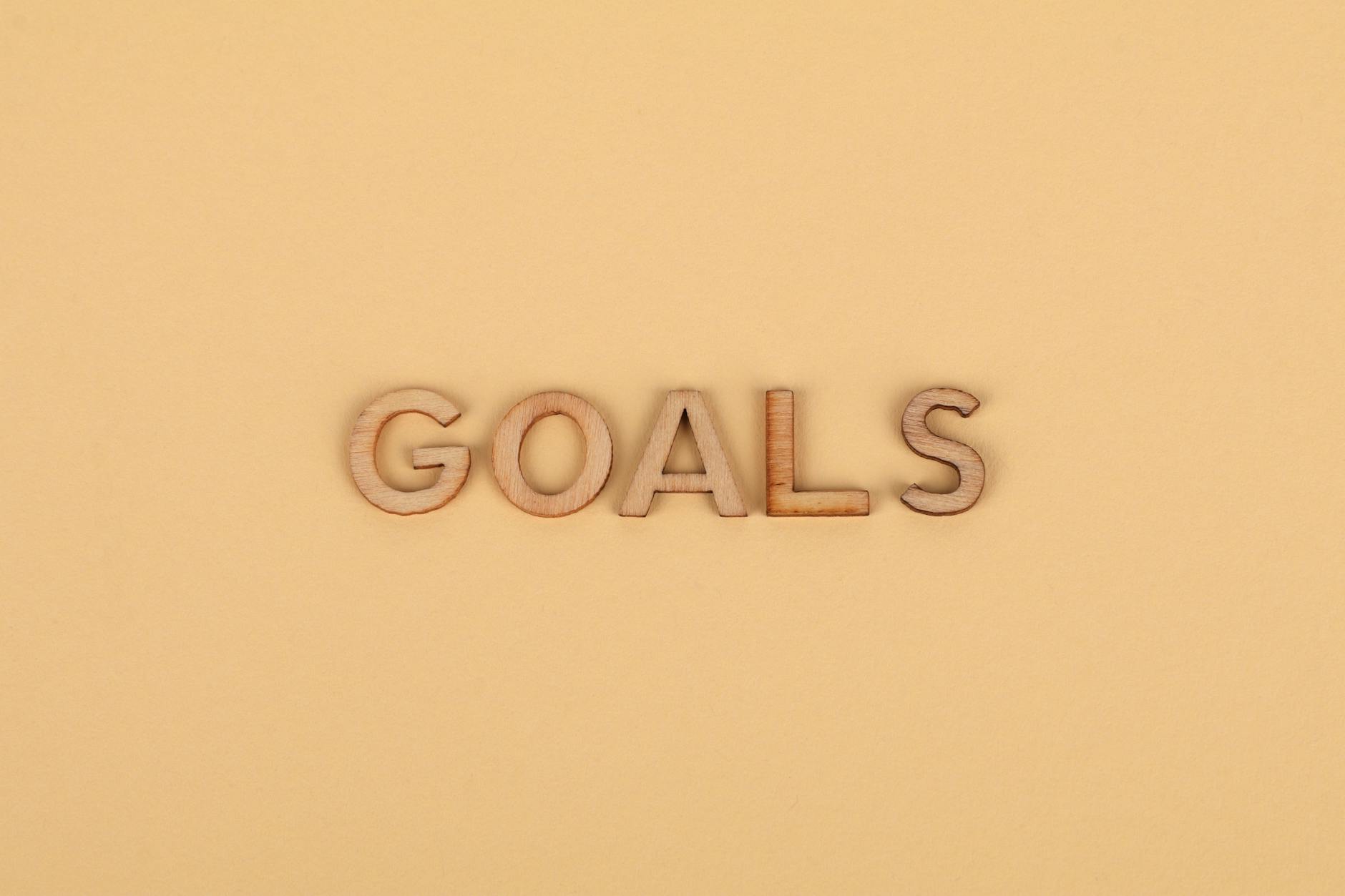 the word goals from wooden letters